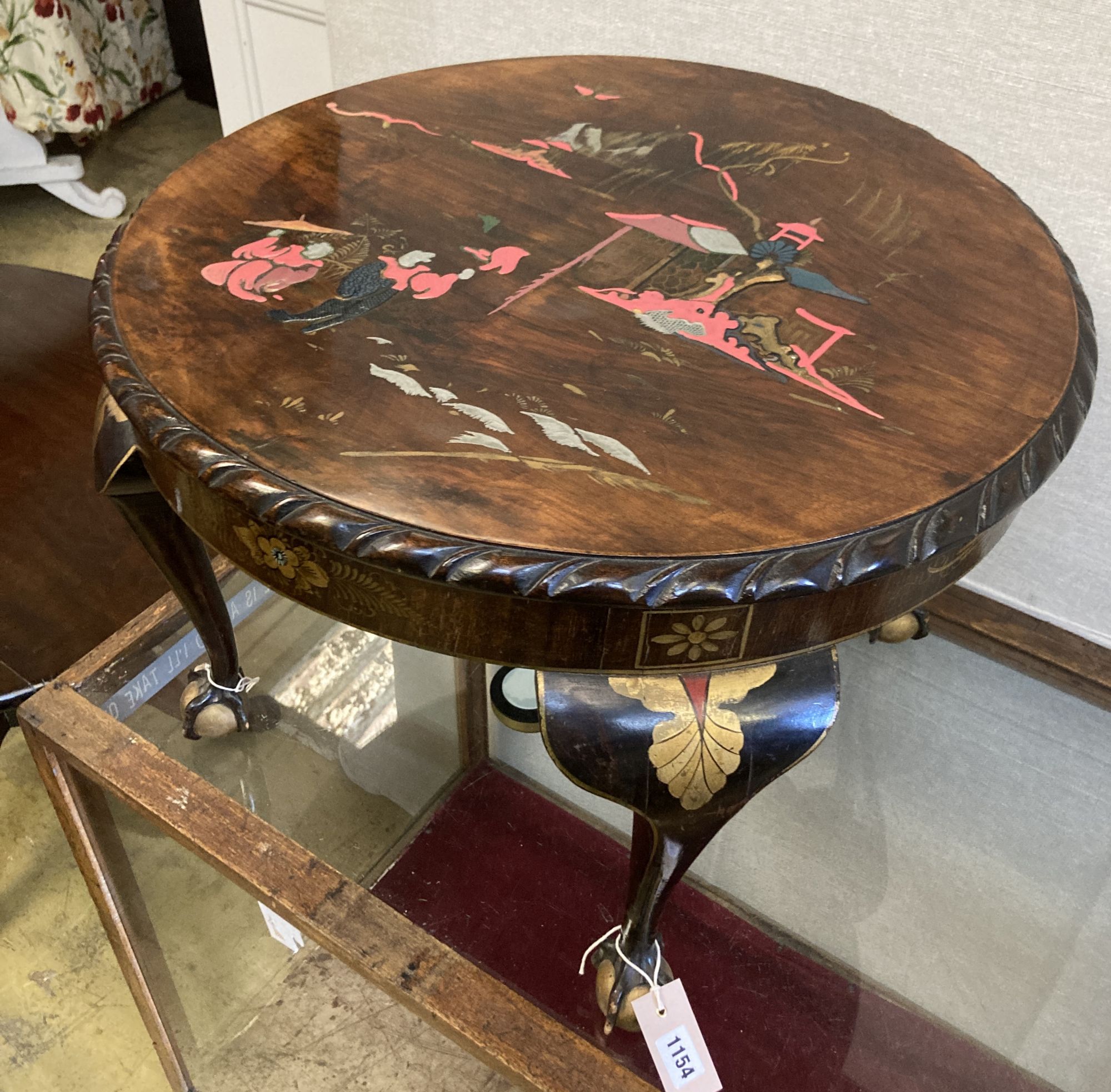 A circular chinoiserie low occasional table, diameter 60cm, height 41cm